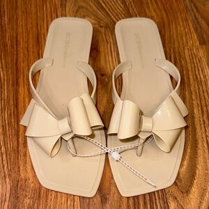 BCBGMaxAzria Women's Tan Bow Lima Jelly Sandals